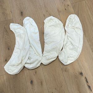 Four SNOO fitted sheets